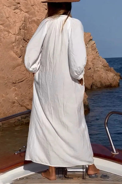 Evelyn® | Nehmen Sie ein lockeres, lockeres Hemd-Maxikleid mit Ballonärmeln und Knopftaschen