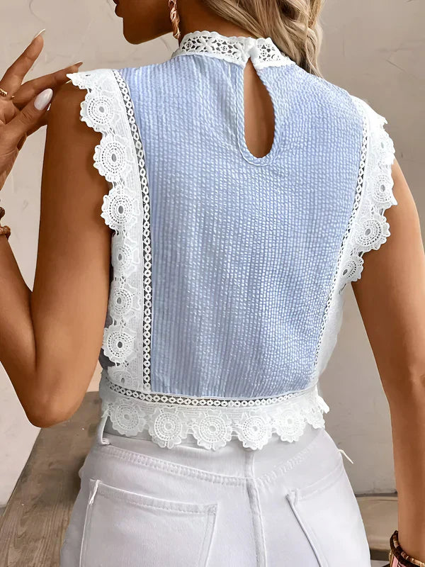Raynel – elegante bluse mit floraler spitzenbordüre und geblümten armeln