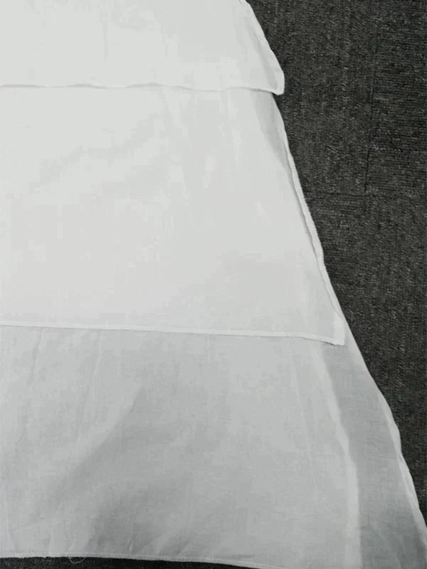 Asymmetrisches lagen-look kleid mit lockerer passform